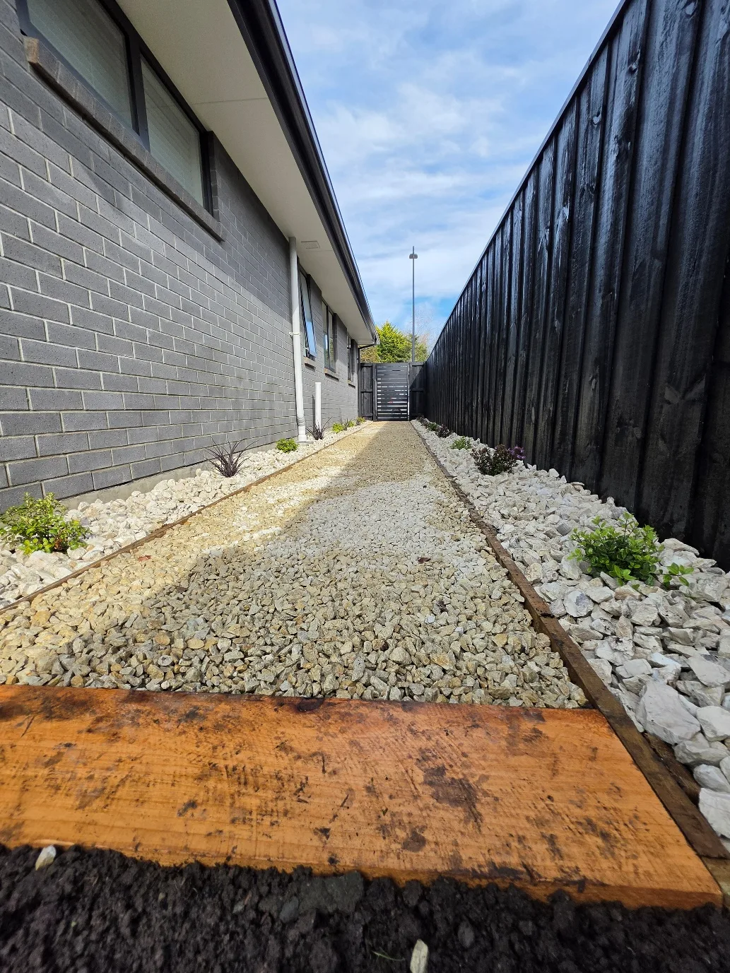 Rear yard preparation and garden areas at 25 Derbridge Street