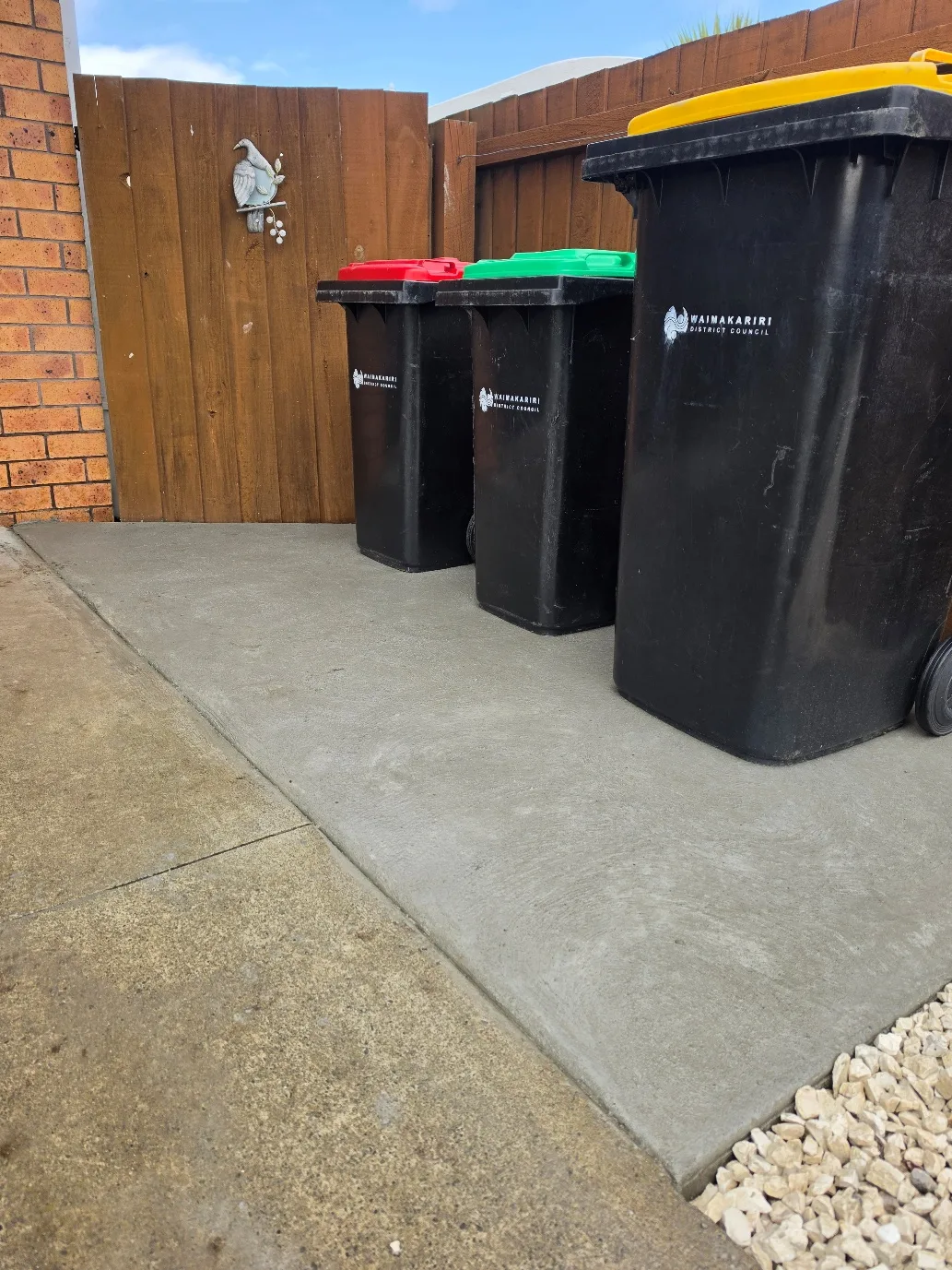 Wheelie bin storage area with timber screening at 25 Derbridge Street landscaping project