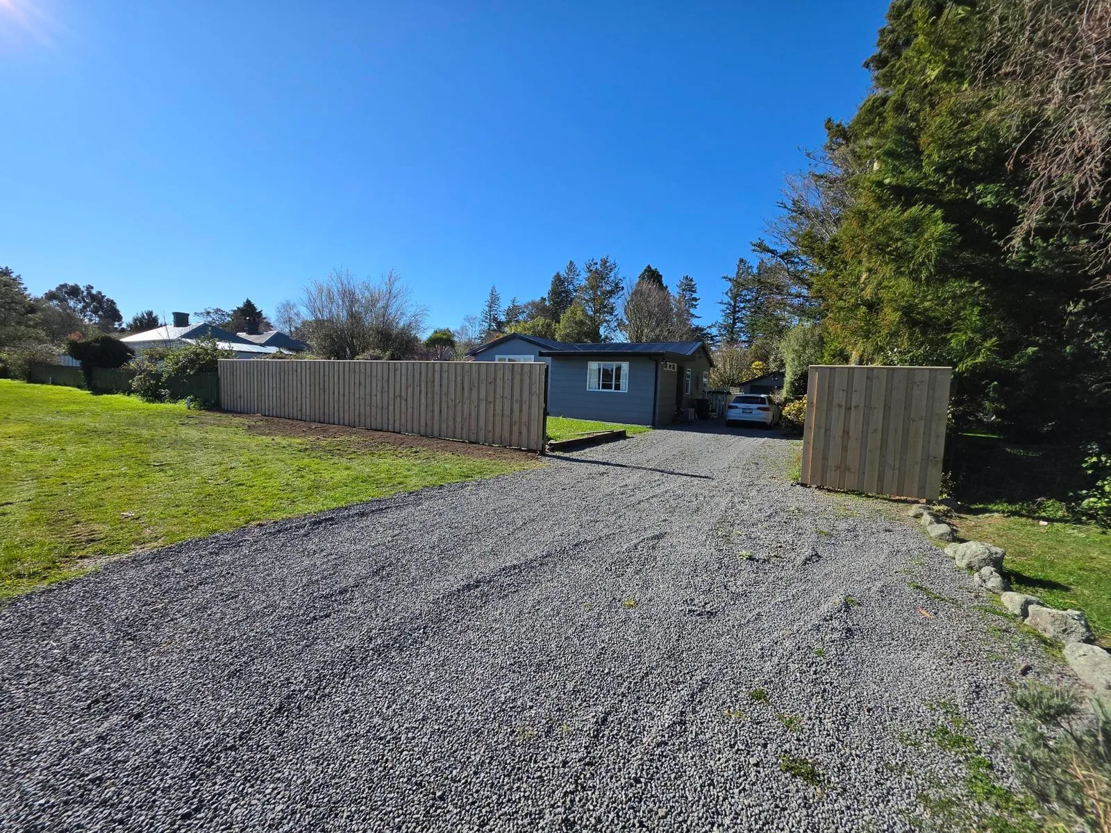 New timber boundary fencing along the driveway at a Waddington residential property